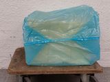 a cart with a plastic bag on top of it