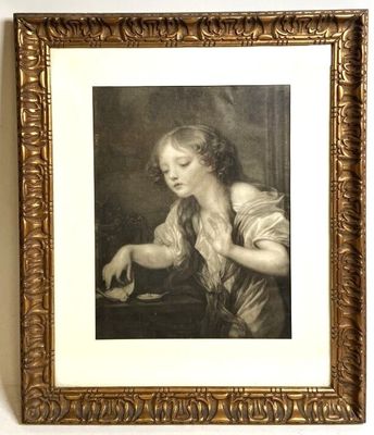 an old picture of a woman sitting at a table with a plate of food