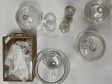 a lot of glass items that are on a table