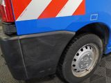 a blue van with a red and white stripe on the side of it