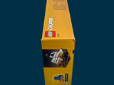 a box of legos sitting on a blue surface