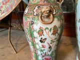 two vases that are sitting next to each other on a table