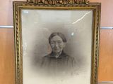 an old picture of a woman in a black and white photo