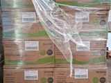 a large stack of boxes on a pallet in a warehouse