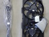 a fan and some wires on the table