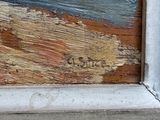 a close up of a painting on a window sill