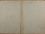 an open book sitting on top of a wooden table next to a window