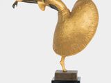 statue of a woman holding a gold heart on a black marble base