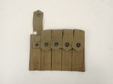 a close up of a piece of military equipment hanging on a wall