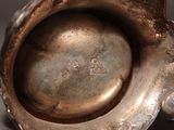 a close up of a metal object on a table