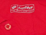 the back of a red polo shirt with a logo on it