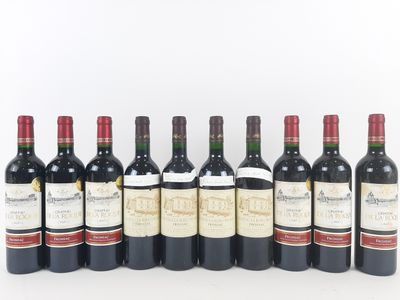 a group of six bottles of wine sitting next to each other