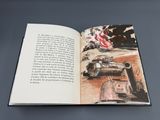 un livre ouvert sur lequel figure l'image d'un char