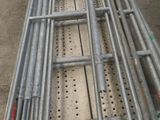 a metal ladder that is sitting on the ground