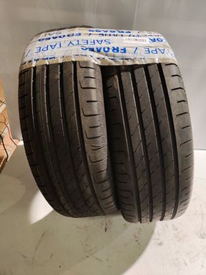 two tires are stacked on top of each other on a table
