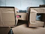 two boxes that are sitting on top of each other