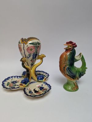 three figurines that are sitting on a table