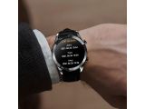 a person wearing a smart watch on their wrist