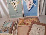 un grand nombre de livres avec des images sur une table