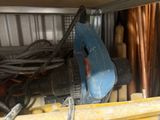 a picture of a cluttered garage with tools and tools