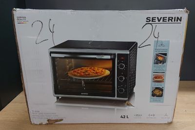 emballage pour four à micro-ondes posé sur une table, contenant une pizza