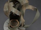 a gas mask that is sitting on top of a table