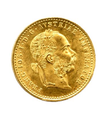 l'image d'une pièce d'or sur laquelle figure le portrait d'un homme
