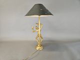 a lamp that is sitting on a table with a lamp on it