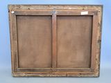 an old wooden picture frame with two open doors on a blue background