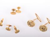 three pairs of gold cufflinks and a pair of cufflinks