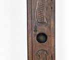 a grandfather clock that is standing in the corner of the room
