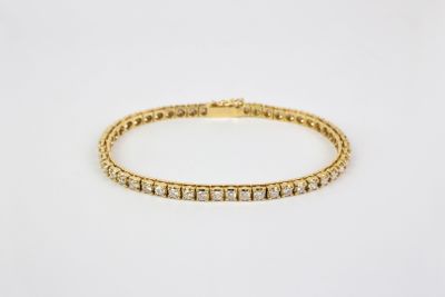 Bracelet tennis en or jaune 14 carats serti de diamants