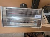 an image of a heater sitting on top of a wooden table