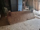 a picture of a room with a brick wall in it