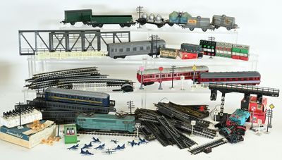 a lot of toy trains that are sitting on a table