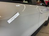 a car that has a sticker on the side of it
