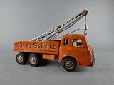 an orange toy truck with a ladder on it