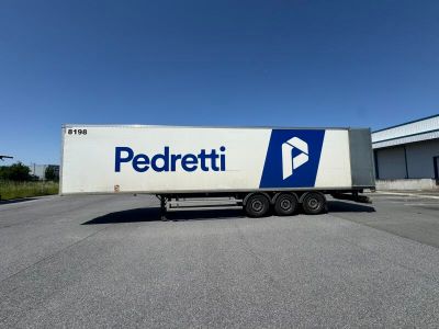 a semi truck that is parked in a parking lot