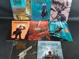 une pile de livres posés les uns à côté des autres sur une table
