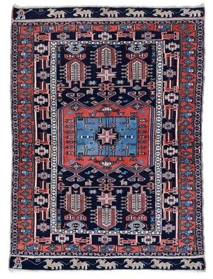 a blue and red rug with geometric design on a white background