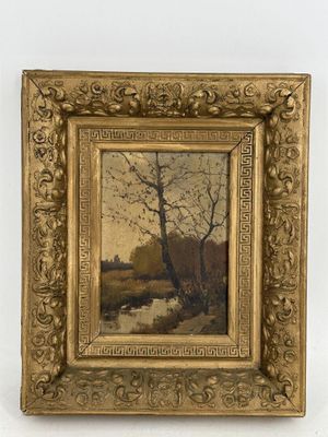 une vieille photo d'un tableau représentant un arbre, dans un cadre doré