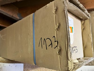 a box that has a sign on it that says eean