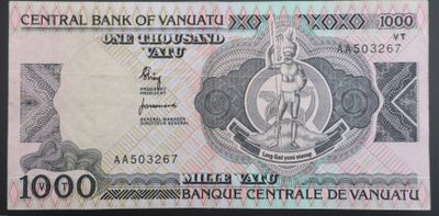 un gros plan d'un billet de banque sur lequel figure le portrait d'un homme