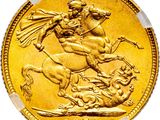 a close up of a gold coin with a man on a horse