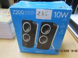 a box of speakers sitting on a table in a room