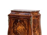a wooden box with a floral design on it