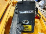 a close up of a yellow box with a black and white label on it