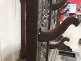 a close up of a door with a bunch of handles on it