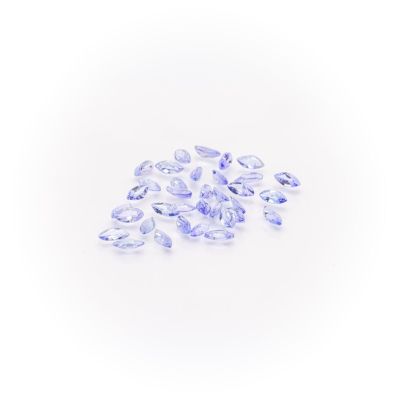 a pile of purple sapphires on a white background