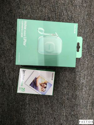 une boîte verte avec l'image d'un bébé à l'intérieur